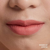 NYX Soft Matte Lip Cream shown on lips in a soft muted rose shade with a smooth matte finish, labeled Shade 63 Kyoto.