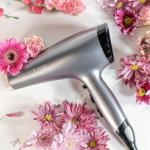 Remington Keratin Protect Hot Hair Brush surrounded by pink flowers