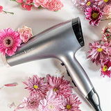 Remington Keratin Protect Hot Hair Brush surrounded by pink flowers