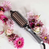 Remington Keratin Protect Hot Hair Brush surrounded by pink and purple flowers