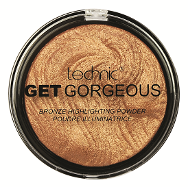 Bronzing highlighting powder, Technic Get Gorgeous, in a round black compact with shimmering golden bronze marbled powder.